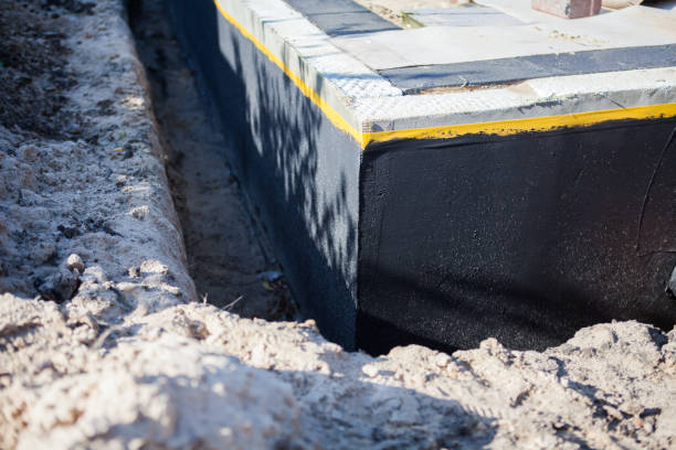 Professional Waterproofing technician working in Pendleton, IN